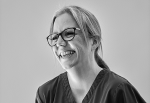 Elysium healthcare employee smiling
