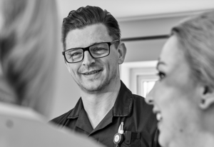 Smiling Elysium Healthcare nurse