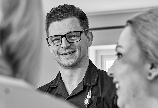 Smiling Elysium Healthcare nurse