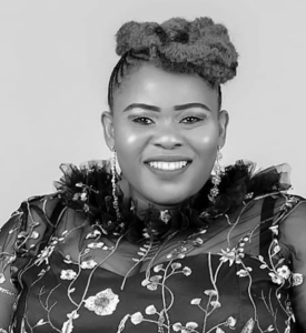 Black and white image of Nkoyo Shadrack, from Nurse to Ward Manager at Elysium Healthcare.