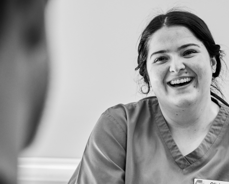 Speech & Language Therapist laughing.