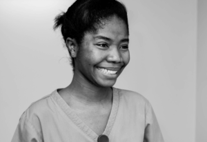 Woman smiling.