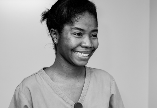 Woman smiling.