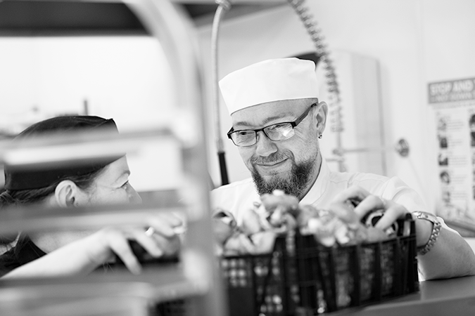 Catering staff in a kitchen.